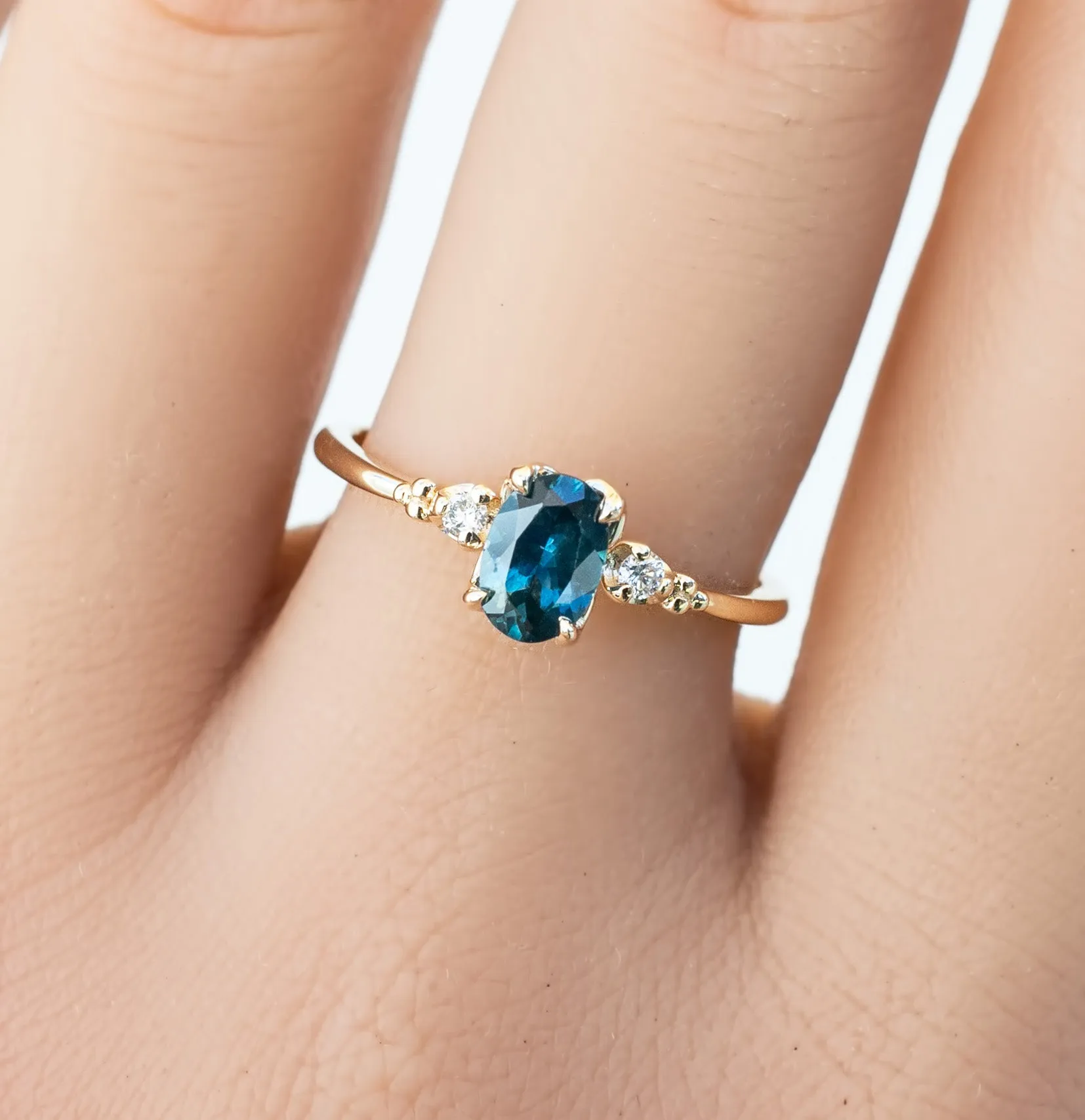 Estel Ring 6.5mm  Oval Teal Blue Montana Sapphire 14K Yellow Gold