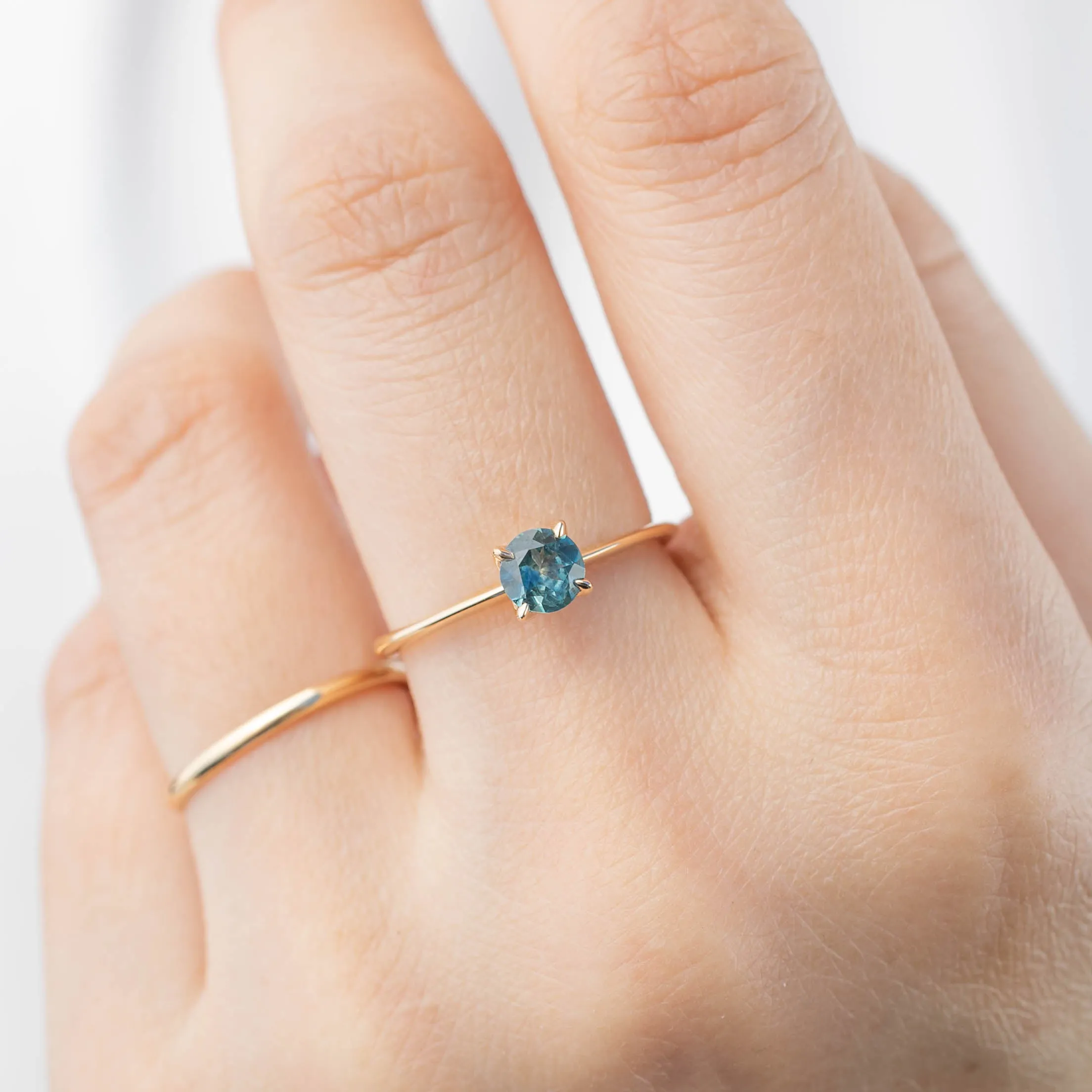 Sara Ring - 5mm 0.55ct Teal Blue Montana Sapphire