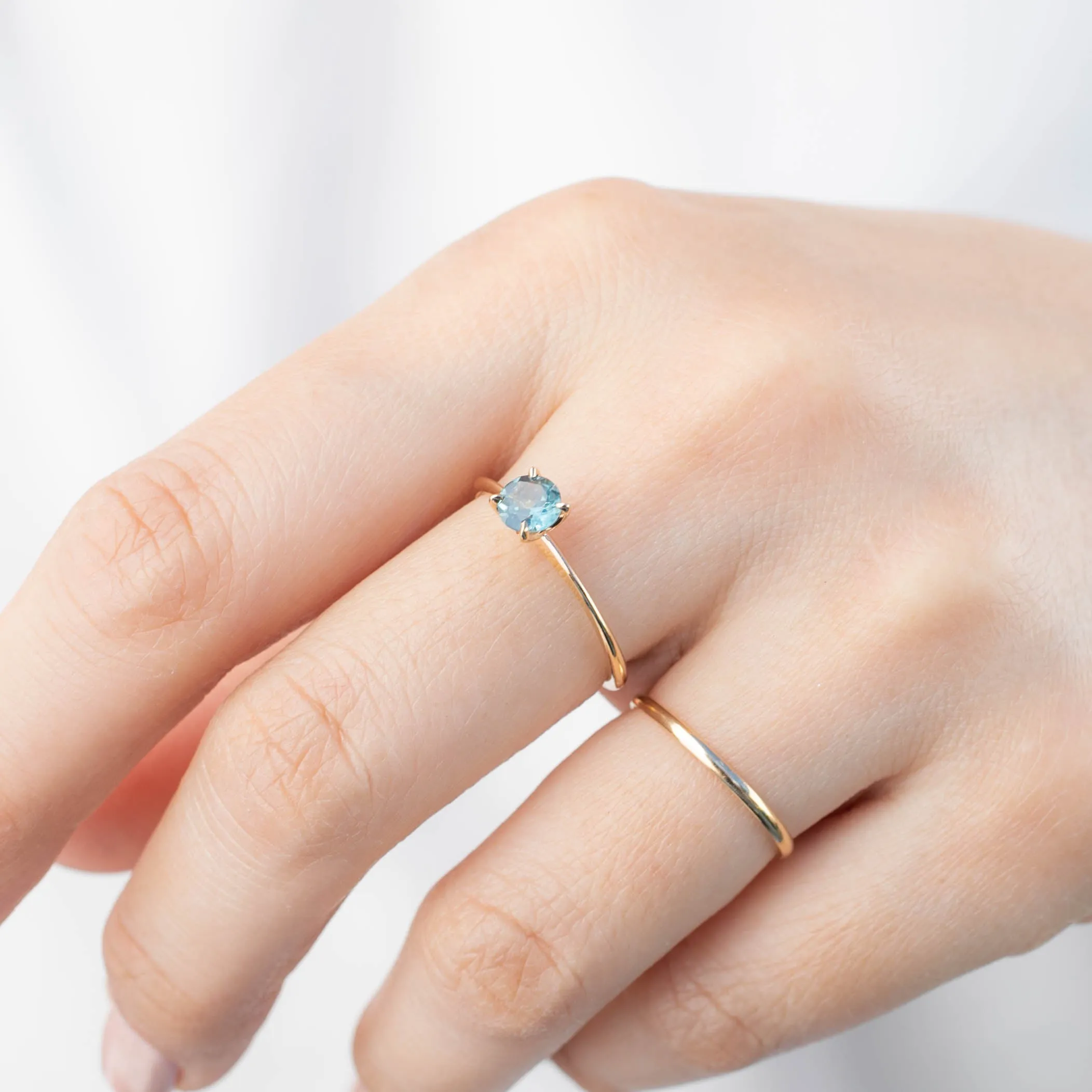 Sara Ring - 5mm 0.55ct Teal Blue Montana Sapphire